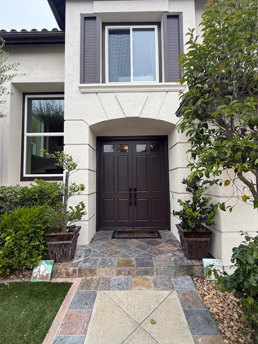 Front entry doors and surround after refinishing