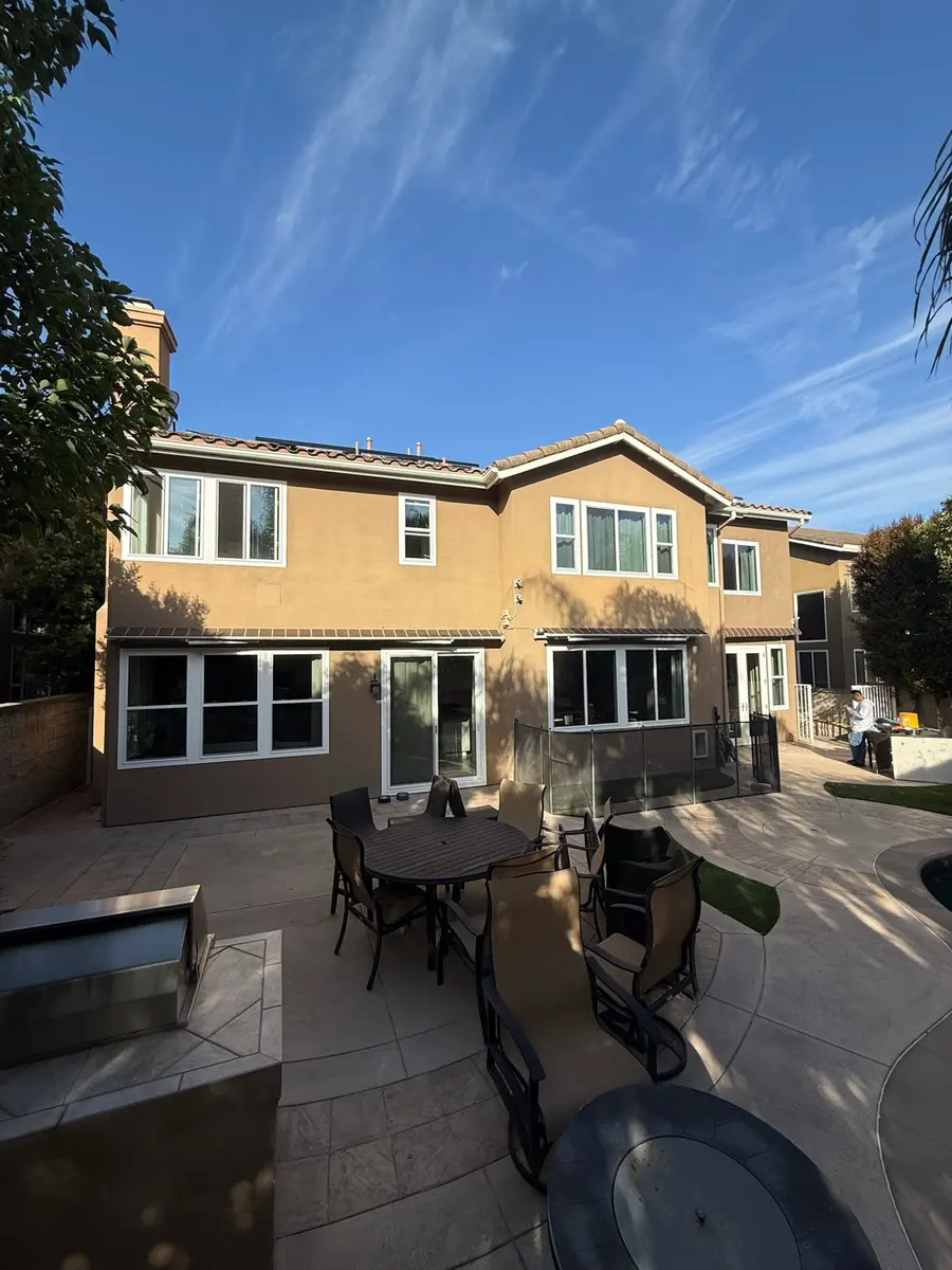 Rear elevation and patio after exterior repaint