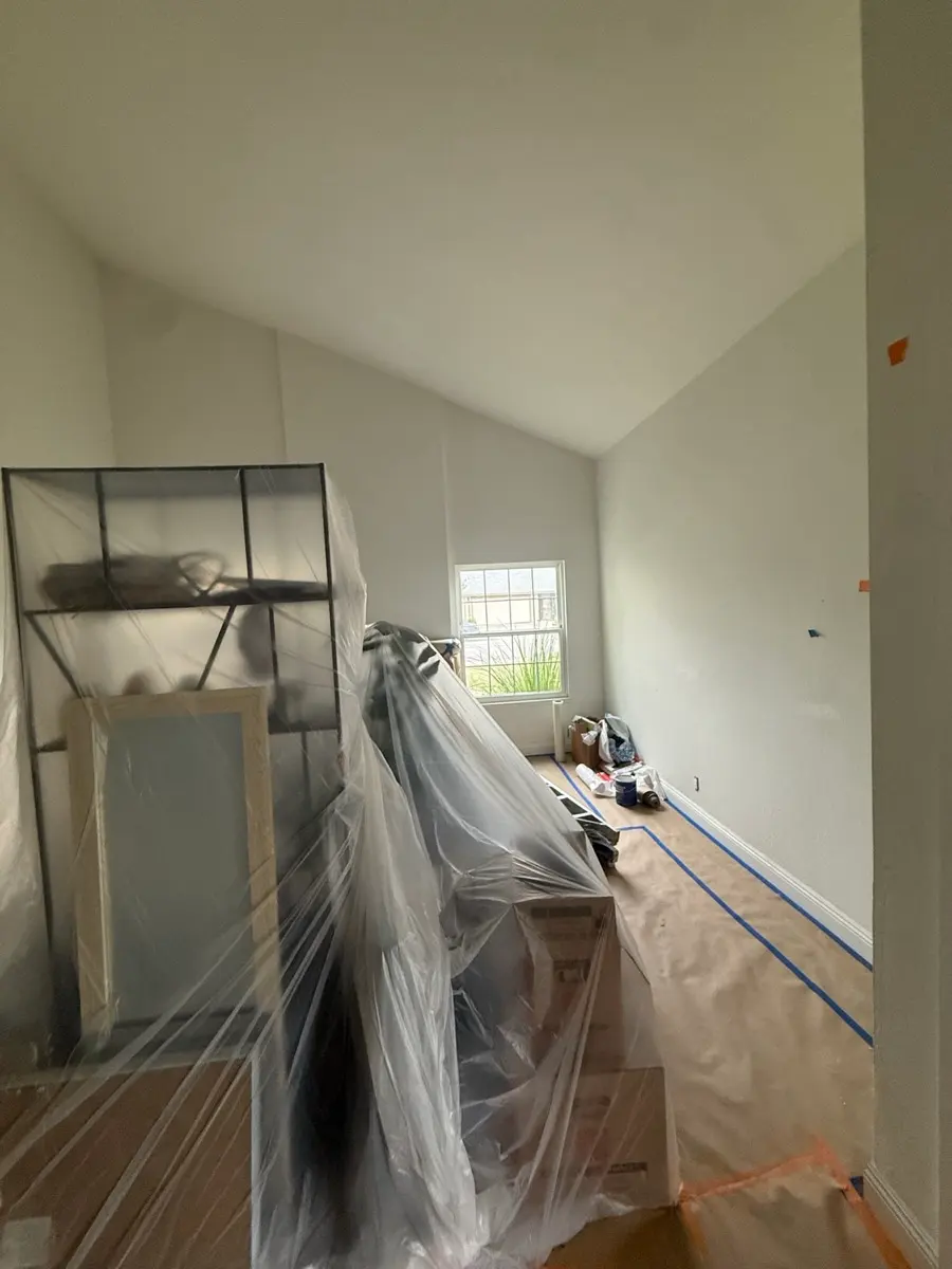 Bedroom masked and prepped, trim taped off